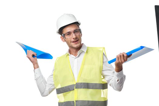 engineer in working uniform protective clothing documents construction. High quality photo