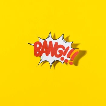 stylish retro comic speech bubble with text bang yellow background. High resolution photo