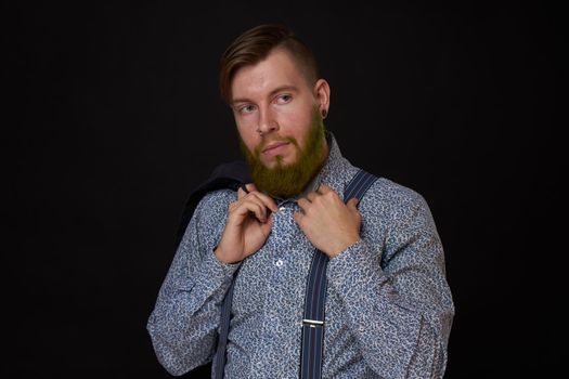 bearded man elegant style shirt dark background. High quality photo