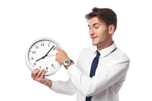 a person with clock in hand break office light background. High quality photo