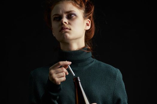 woman with cigarette bottle of alcohol bruises under eyes problems depression. High quality photo