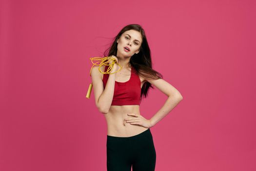 cheerful sportswoman fitness exercise workout isolated background. High quality photo
