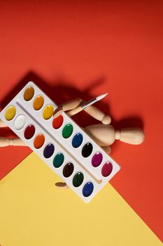 paints for artist drawing school learning art red background. High quality photo