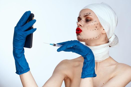 female patient in blue gloves syringe in hands contour on the face lifting studio lifestyle. High quality photo