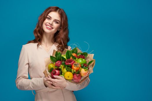 beautiful woman posing fresh fruits bouquet emotions isolated background. High quality photo