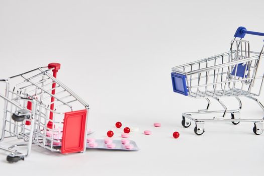 drug trolleys pharmacy shopping light background pharmacy. High quality photo