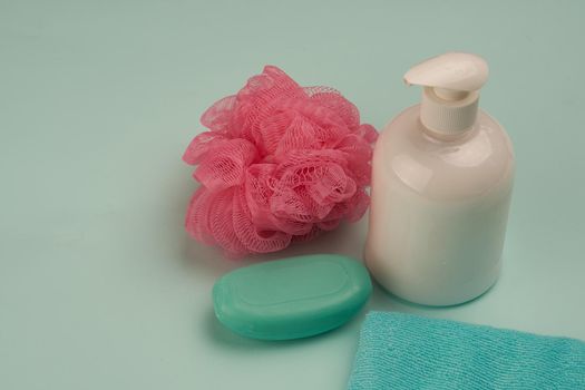 soap hygiene body care bathroom supplies green background. High quality photo