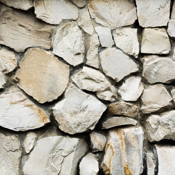 old big rocks stone wall texture background. High resolution photo