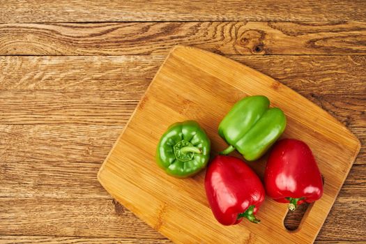vegetables on a cutting board kitchen pepper healthy food. High quality photo