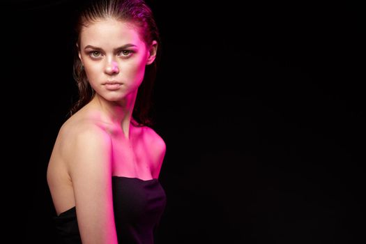 woman model bare shoulders clean skin wet hair dark background. High quality photo