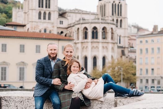 A beautiful family with strolls through the old city of Lyon in France.Family trip to the old cities of France.