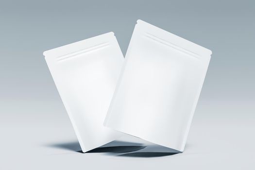 mockup of two bags of supplements suspended in the air. 3d rendering