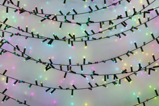 abstract background of christmas lights illuminated in all colors. 3d rendering