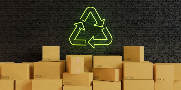 cardboard boxes stacked on a dark brick wall with a green neon lamp with the recycling symbol illuminated. recycling concept. 3d render
