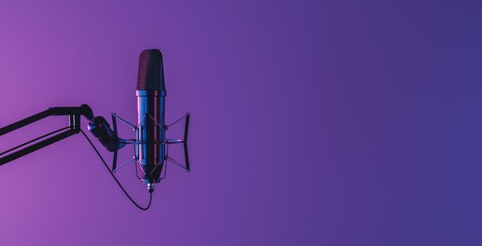 studio microphone isolated on dark background with neon lighting and space for text. 3d render