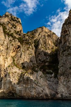 Edge of high cliff next to the sea at sunny day on Capri island