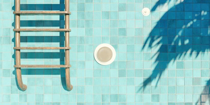 enclosed shot of rusty stairs in an empty blue tiled pool with a spotlight and palm tree shadows. 3d render