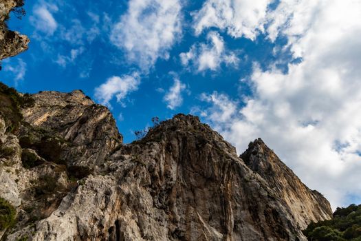 Edge of high cliff next to the sea at sunny day on Capri island