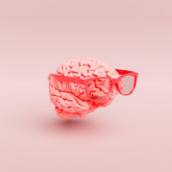 minimalistic scene of a brain with glasses in pastel red color. concept of learning, ideas, inspiration and creativity. 3d render