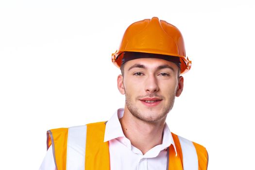 man in orange hard hat engineer work professionals construction. High quality photo