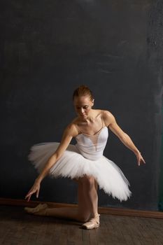 woman ballerina in white tutu performance grace dance. High quality photo