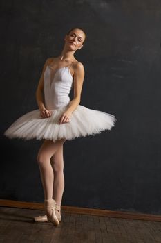 woman ballerina in white tutu performance grace dance. High quality photo