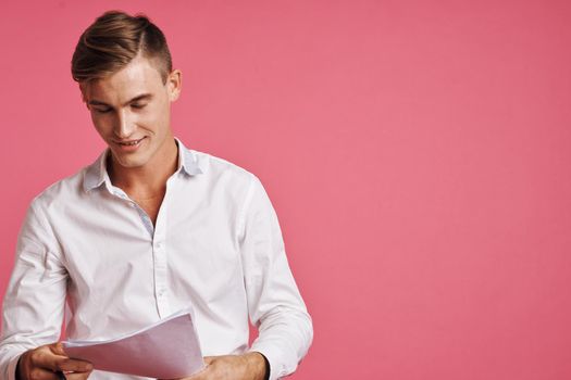 portrait of a man reading documents in hand isolated background. High quality photo