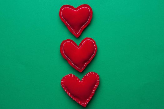 paper hearts postcards valentines day green background. High quality photo