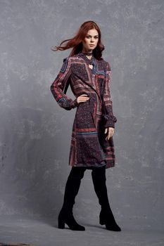 woman in coat posing fashion clothing full length. High quality photo