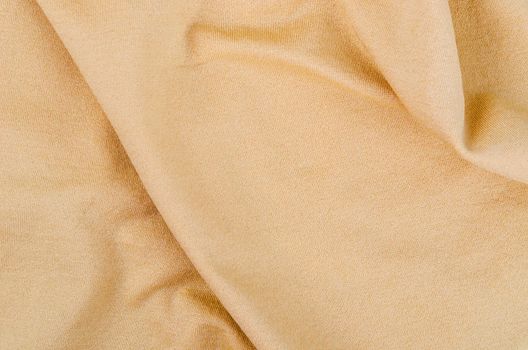 Brown fabric texture for clothes, as background.