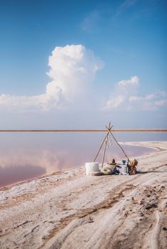 moroccan decor on the shores of a beautiful lake, candles and bungalows