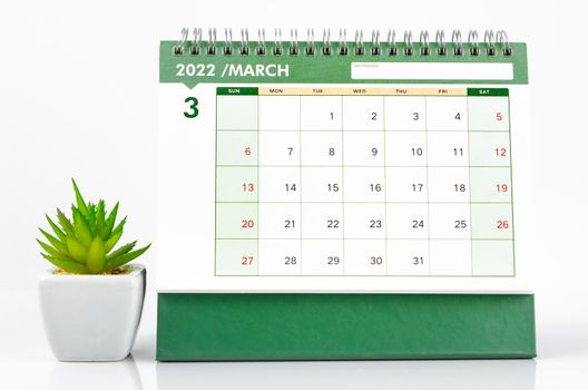 The March desk calendar 2022 on white background.
