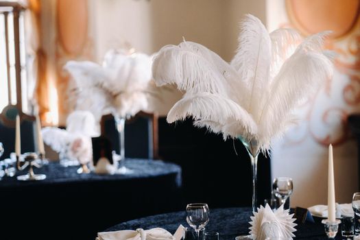 decorated festive table for a wedding evening in an old castle.