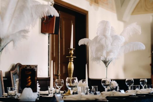 decorated festive table for a wedding evening in an old castle.