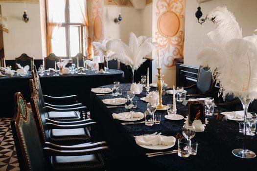 decorated festive table for a wedding evening in an old castle.