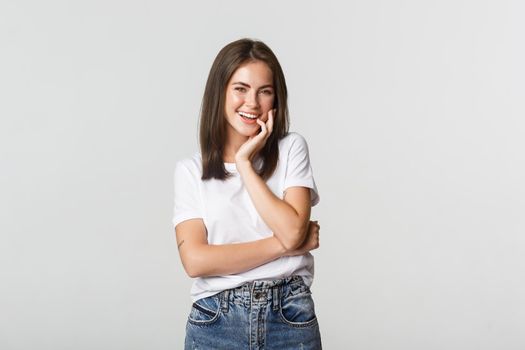 Portrait of attrative coquettish girl laughing silly.