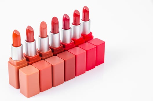Different lipsticks set isolated on white background. Cosmetic product.