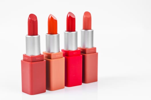 Different lipsticks set isolated on white background. Cosmetic product.