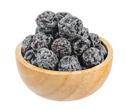 Salted Black plum in wooden bowl isolated on white background, save clipping path.