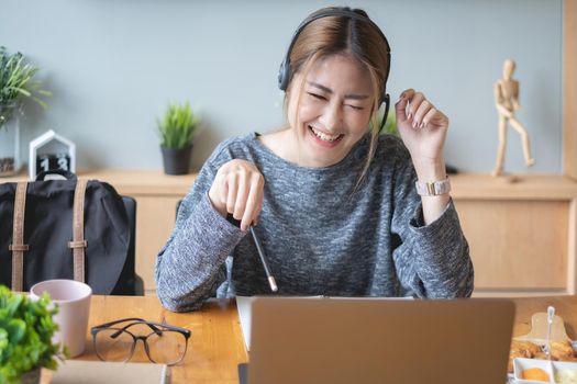 Student learning at home with online lesson by laptop computer. E-learning ,online ,education and internet social distancing protect from COVID-19 viruses concept.