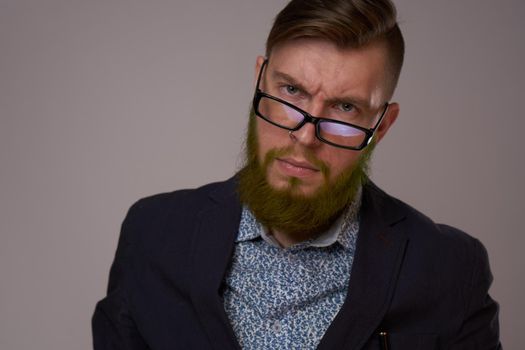 business man with glasses with tattoos on his arms office professionals. High quality photo