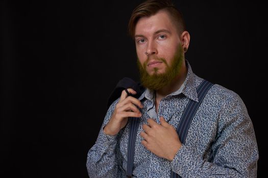 bearded man elegant style shirt dark background. High quality photo