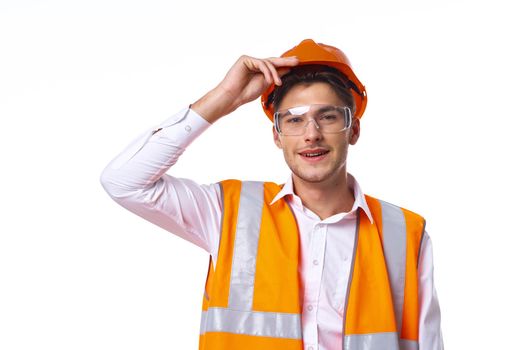 man in work uniform orange helmet safety professional work. High quality photo