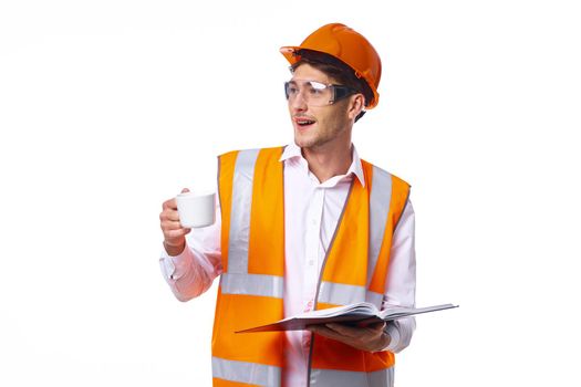 man in work uniform orange helmet safety professional work. High quality photo