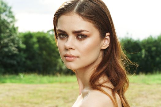 smiling woman Cosmetology nature green leaves glamor model. High quality photo