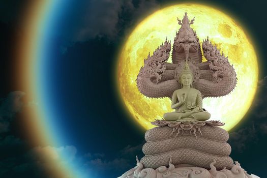 full moon corona light and Buddha sitting on  seven head of king naga on the night sky, Elements of this image furnished by NASA
