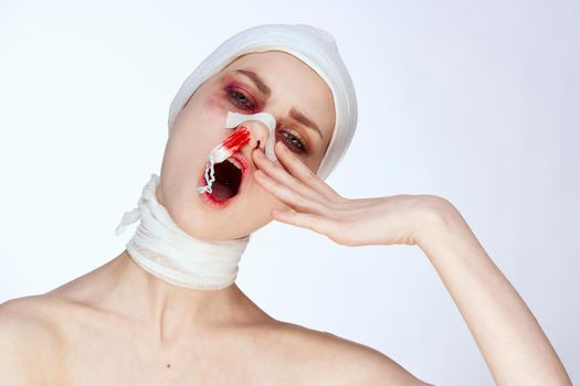 emotional woman plastic surgery operation bare shoulders studio lifestyle. High quality photo