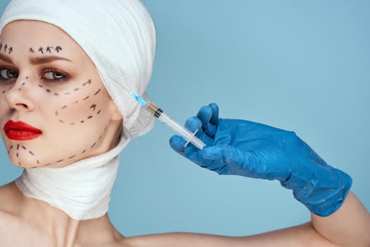 a person posing in blue gloves red lips surgery facial rejuvenation studio lifestyle. High quality photo