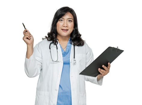 Asian doctor with stethoscope holding pen and clipboard on white background.
