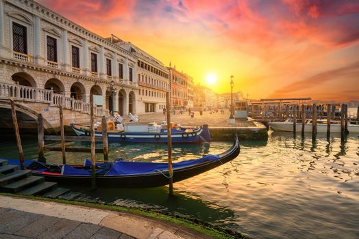 Gondola and architecture in Venice at sunset, Italy